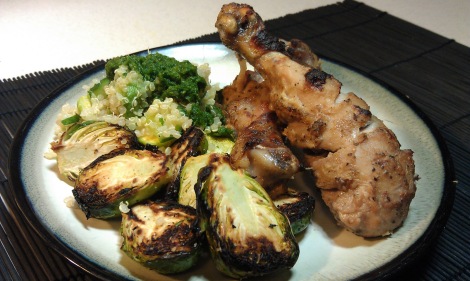 Garlic broiled Brussels sprouts, served with Quinoa Salad, Cilantro chutney, and Baked chicken marinated in pear, sage, and ginger. (photo)